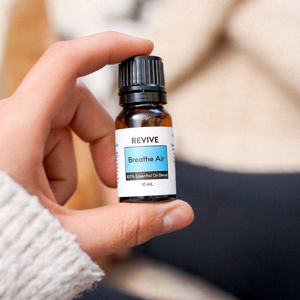 Close-up of Revive Essential Oils Breathe Air bottle