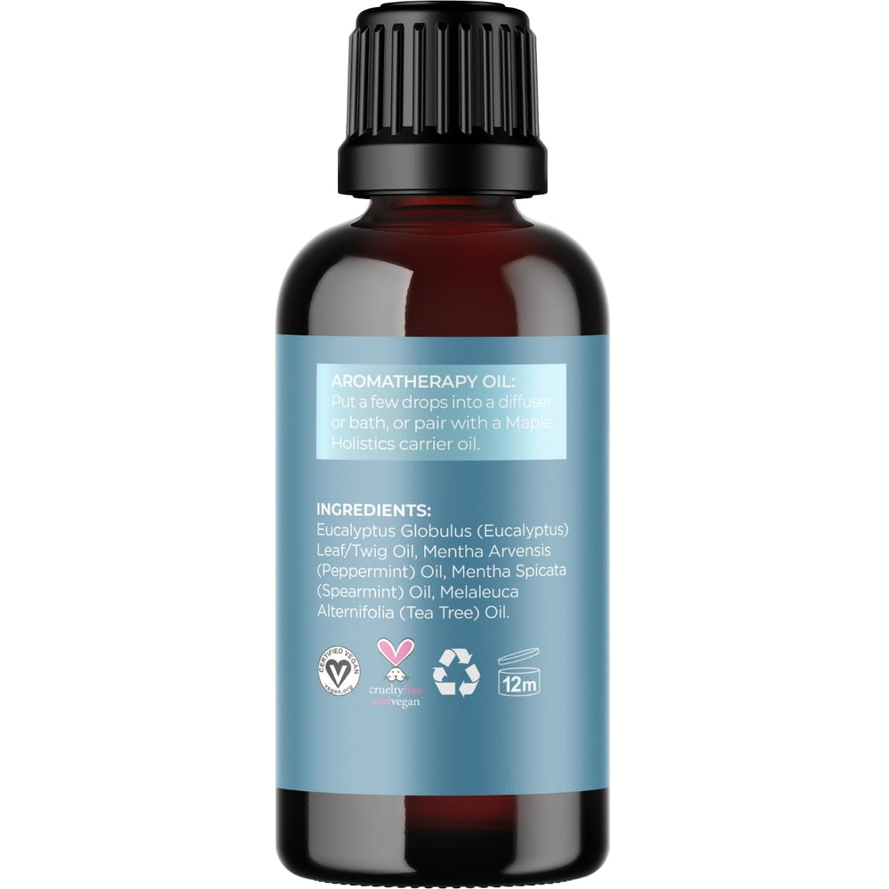 Aromatherapy setup with diffuser and Breathe oil in a spa-like setting