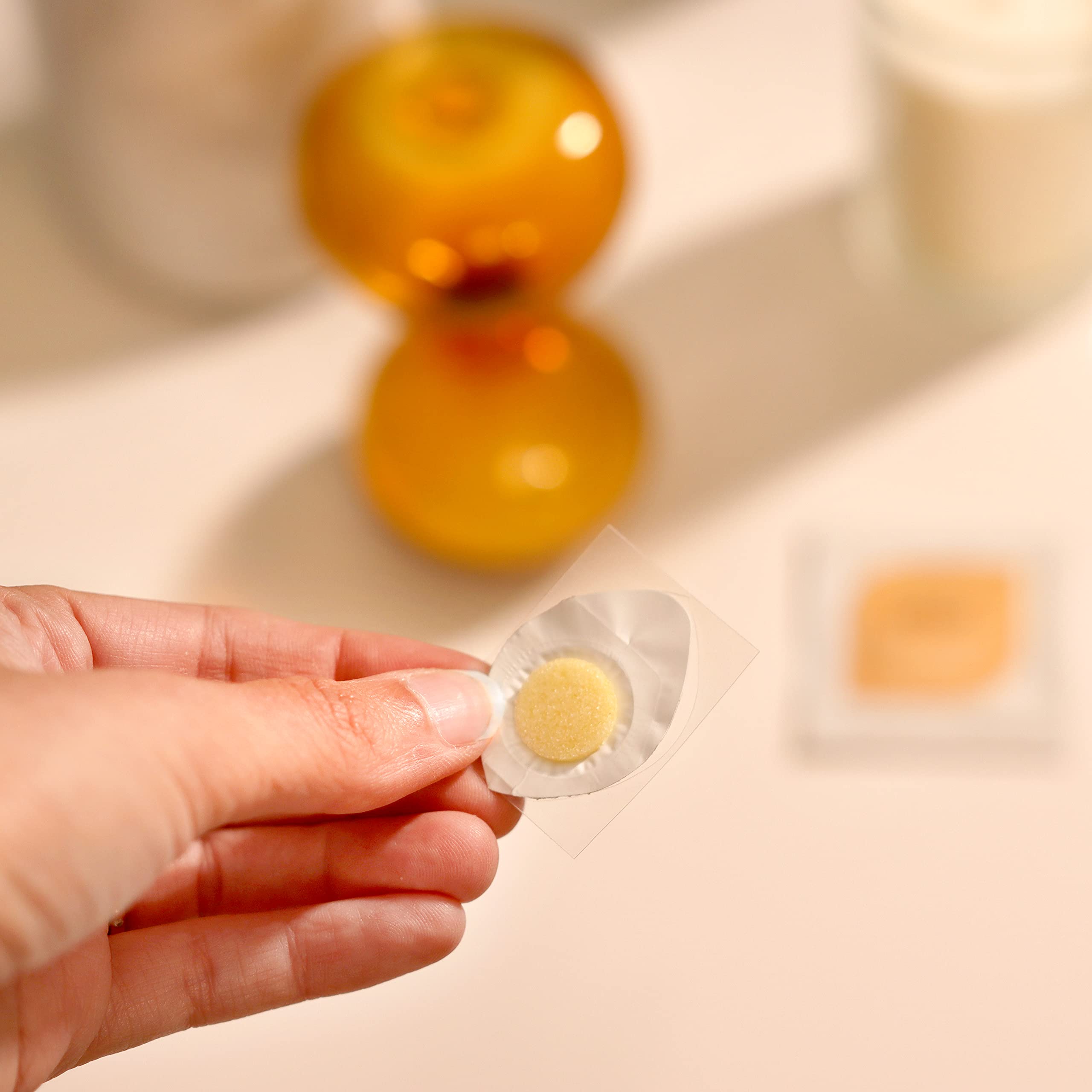 Breatherapy Aroma Patch worn on wrist for quick, portable aromatherapy access