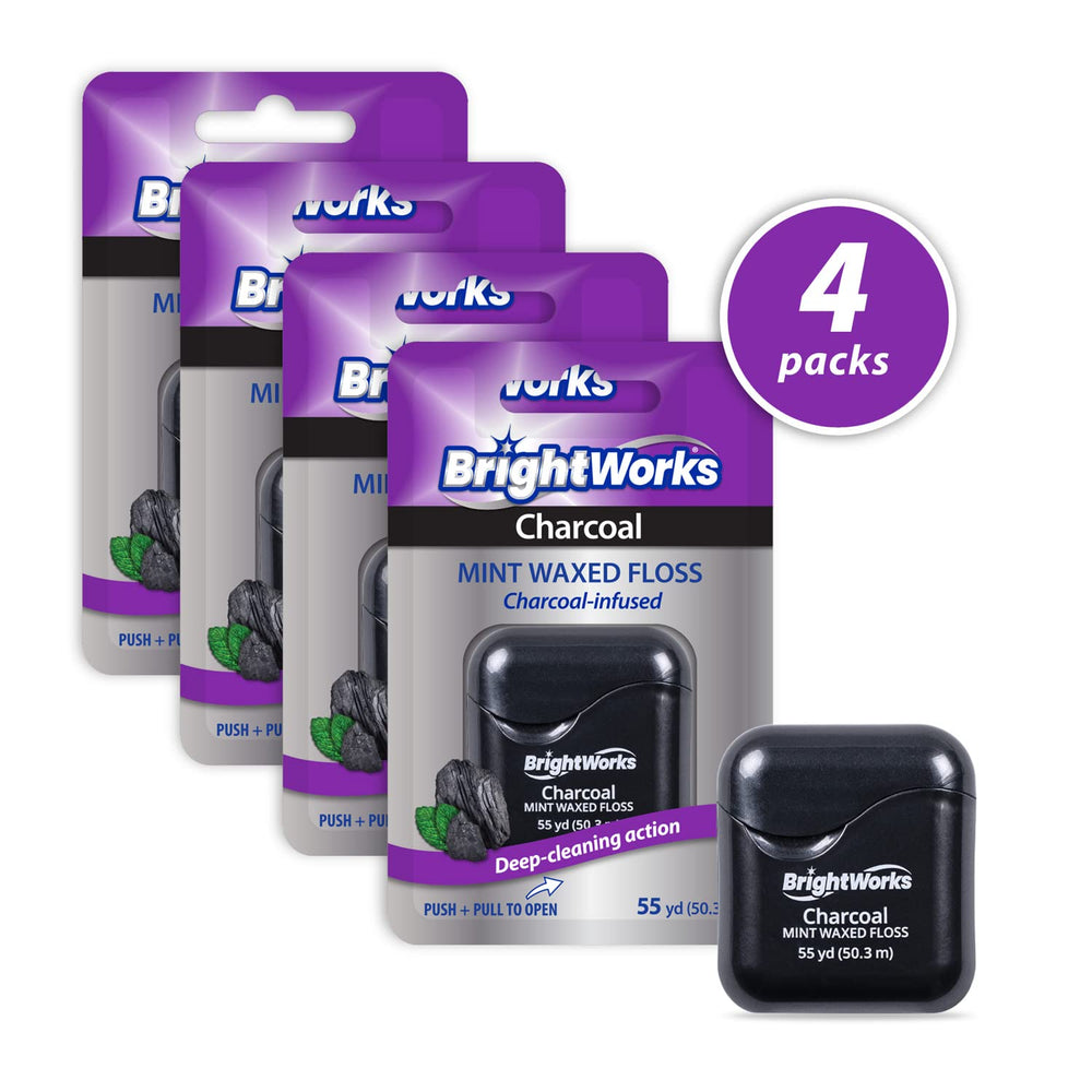 Close-up of BrightWorks Charcoal Dental Floss between teeth