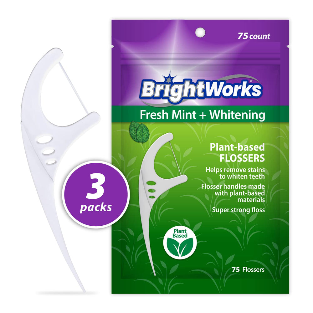 Close-up of mint-flavored floss with micro-crystals for whitening.