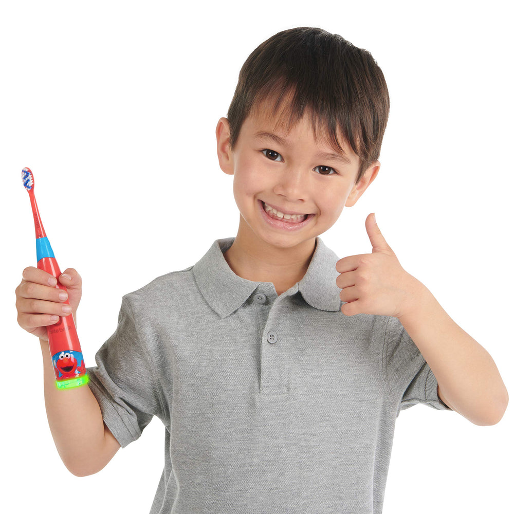 Two soft brush heads included (blue and red)