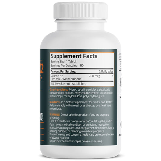 Close-up of Bronson Vitamin K2 MK-7 200 mcg vegetarian tablet