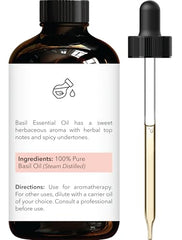 Amber glass dropper bottle of Basil essential oil with dropper