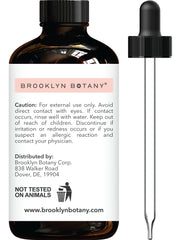 Close-up of Helichrysum essential oil dropper and bottle