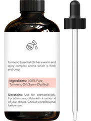 Dropper bottle of turmeric essential oil by Brooklyn Botany