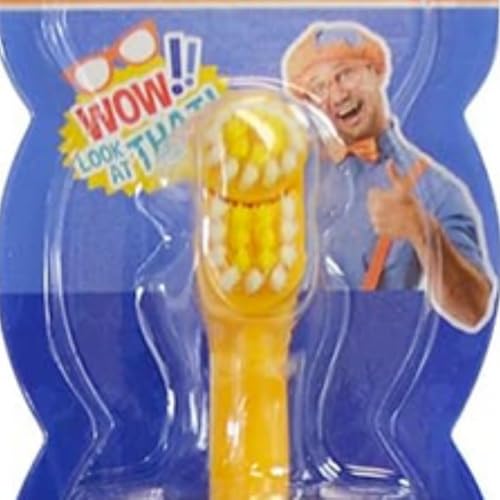 Close-up of Blippi-themed children's electric toothbrush in bright colors