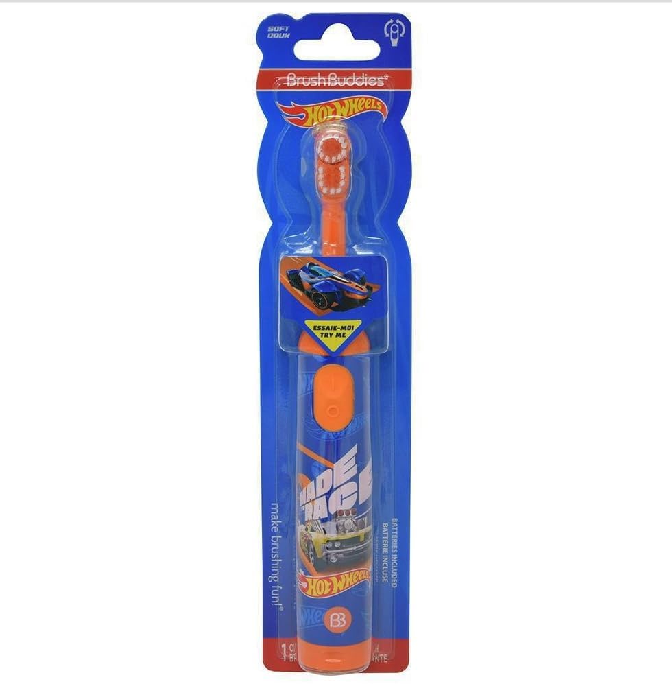 Child brushing teeth with Hot Wheels electric toothbrush