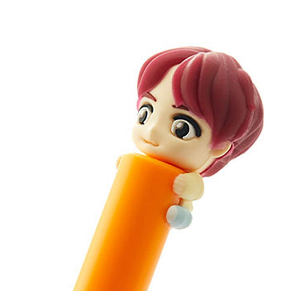 Detachable BTS figure cap shown on the toothbrush