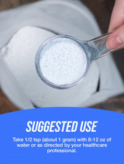 Close-up of fine white ascorbic acid powder texture