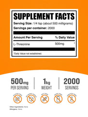 Scooped L-Threonine powder ready to be added to a beverage