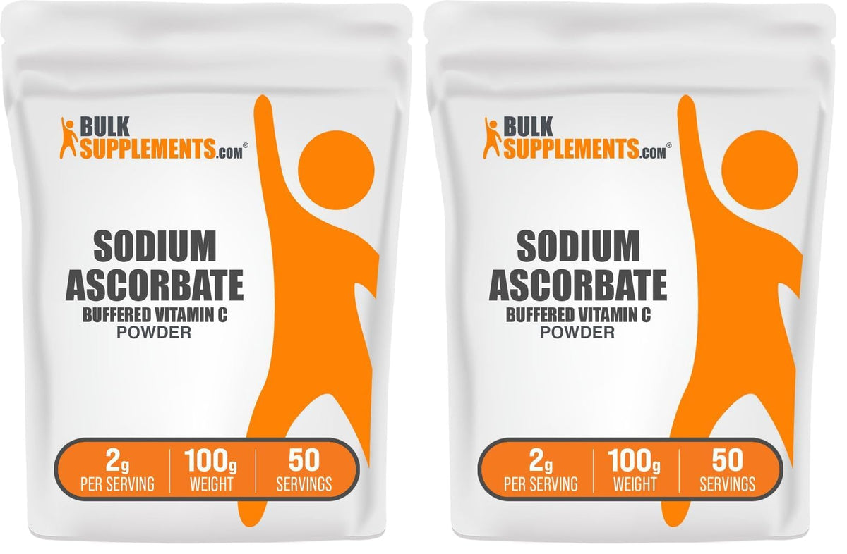 Sodium ascorbate powder in a scoop with a BulkSupplements jar