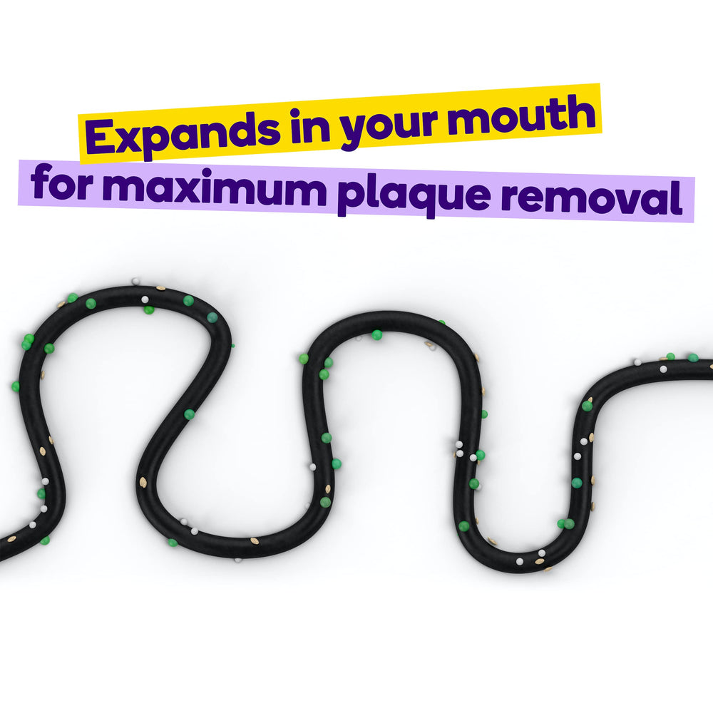 Expanding floss expanding on contact with saliva to remove plaque