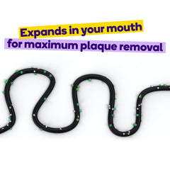 Expanding floss expanding on contact with saliva to remove plaque