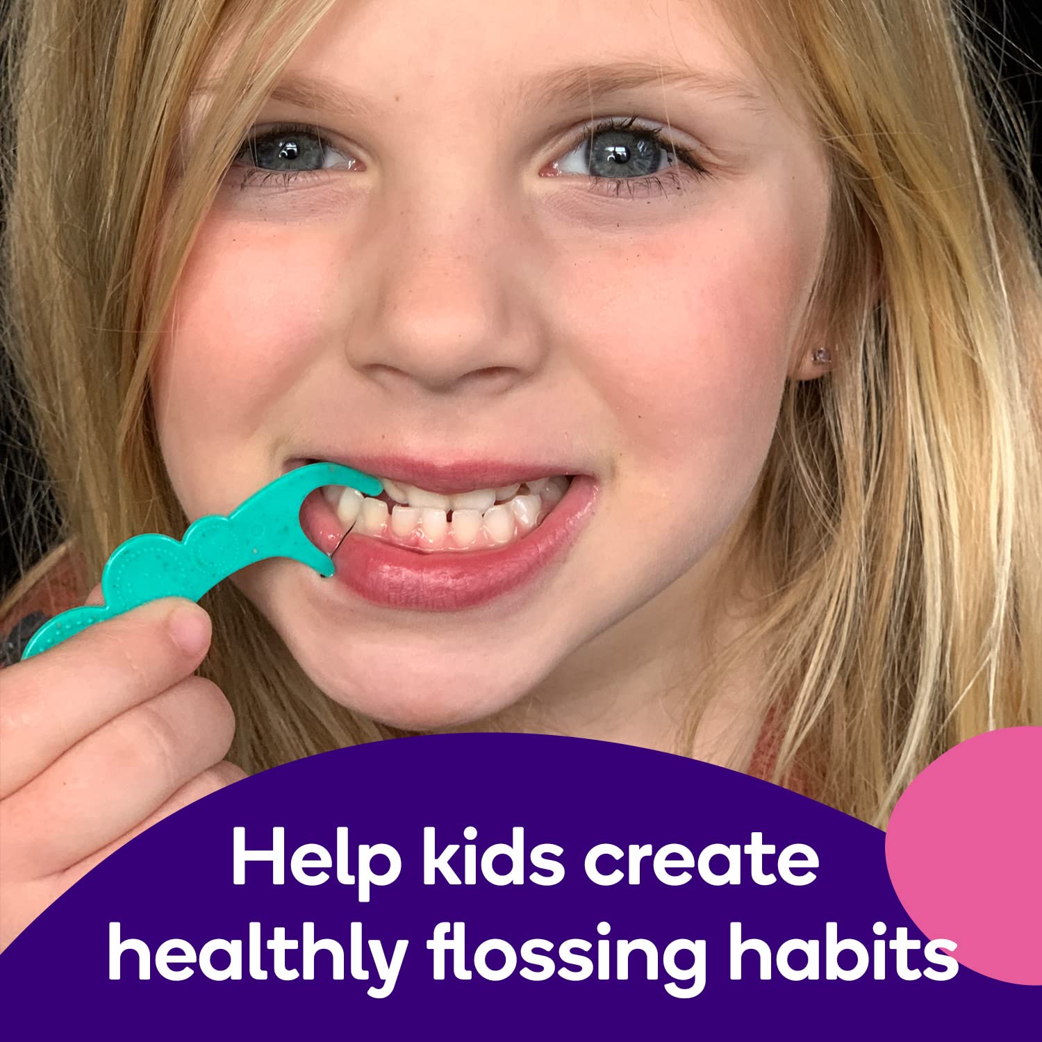 Colorful smiley-face floss picks in blue, green, and pink