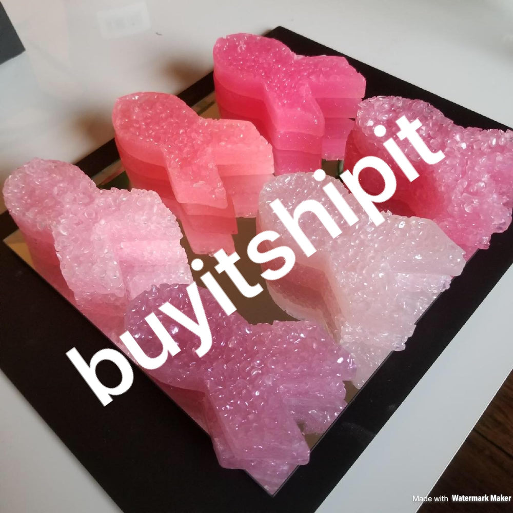 Beads poured into a mold for DIY scented shapes