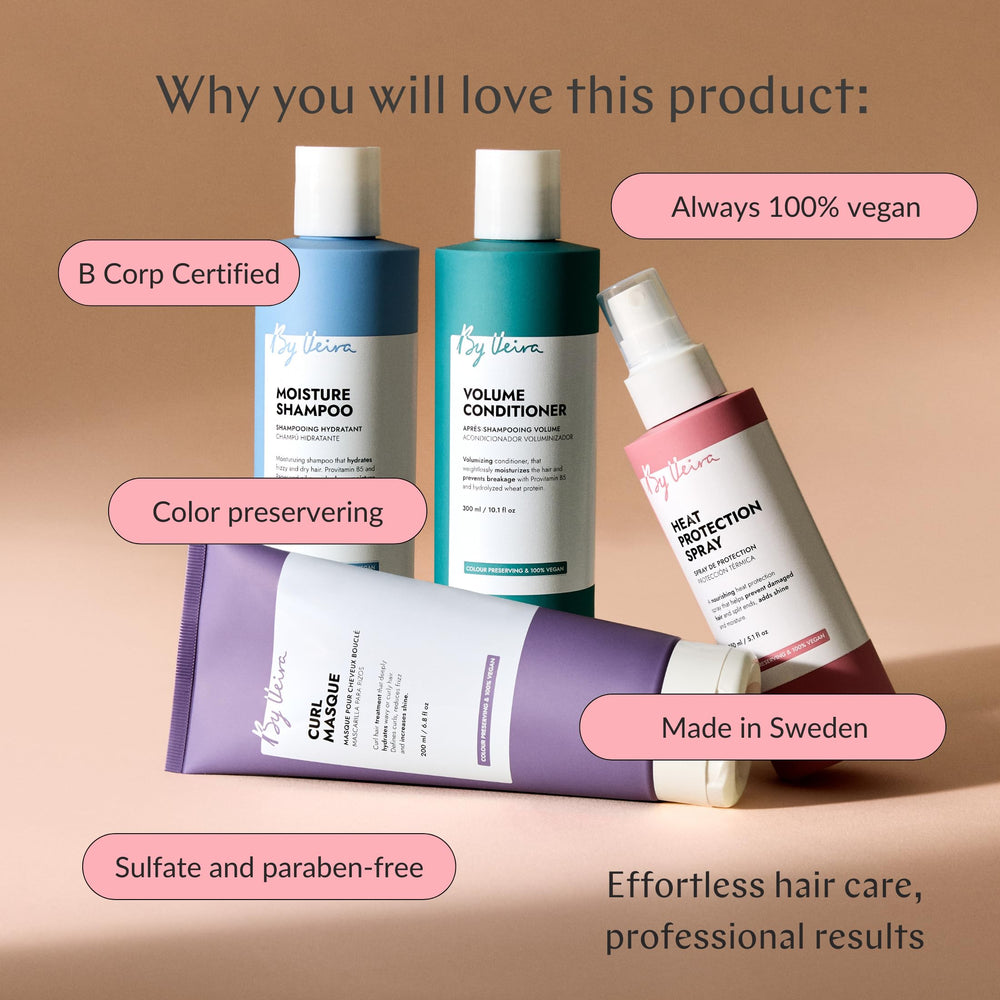 Color-preserving By Veira Curl Cream applied to color-treated curls for lasting vibrancy.