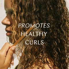 Shiny, healthy-looking curls achieved with By Veira Curl Cream's nourishing blend.