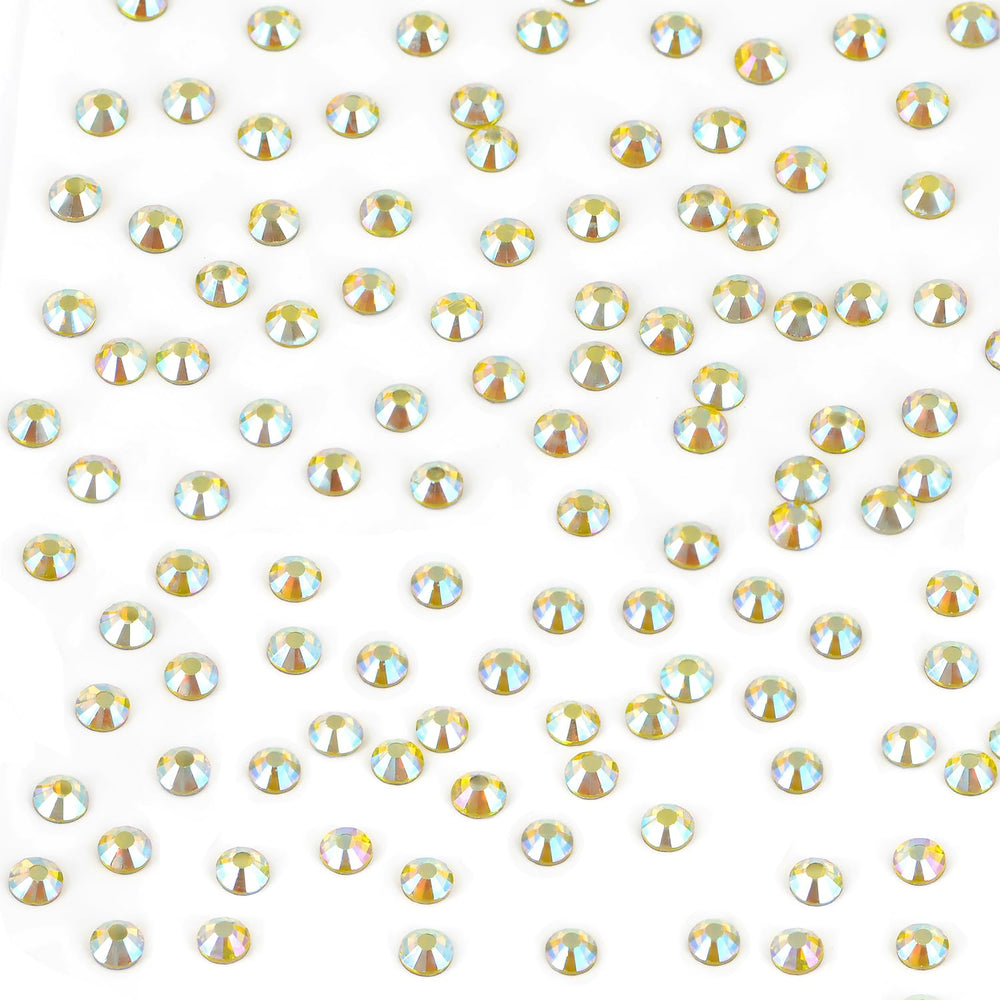 Bymitel rhinestones in a craft project showing heat transfer onto fabric and accessories.