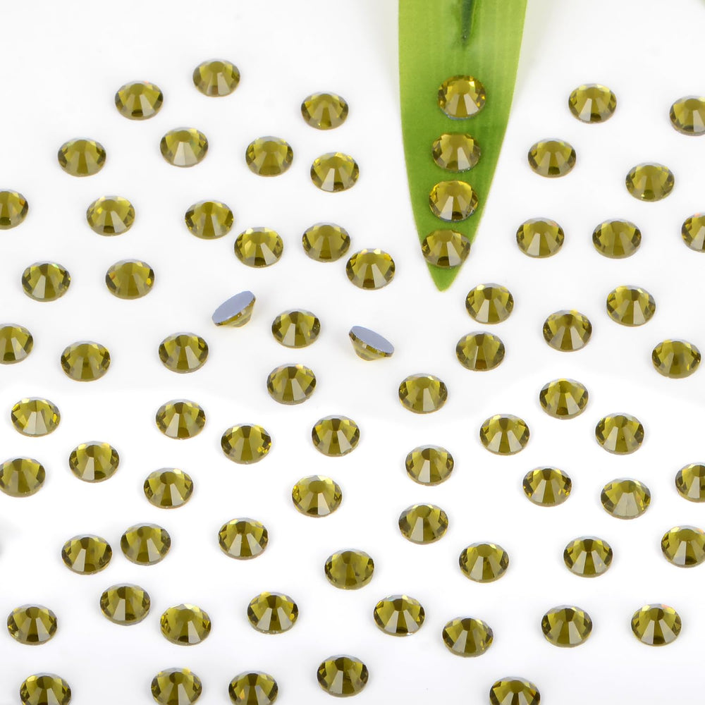 Bymitel Olivine 3.8mm rhinestones with heat-activated glue for easy application.