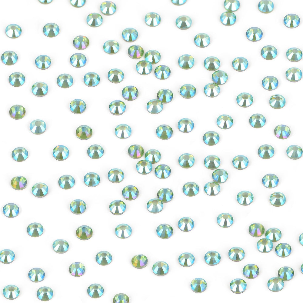 Versatile embellishments for nails, clothing, shoes, and accessories using Bymitel rhinestones.