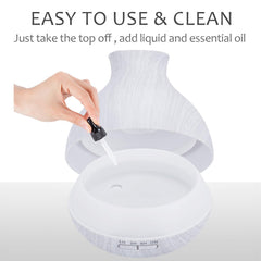 Sleek white wood grain diffuser blends with home decor