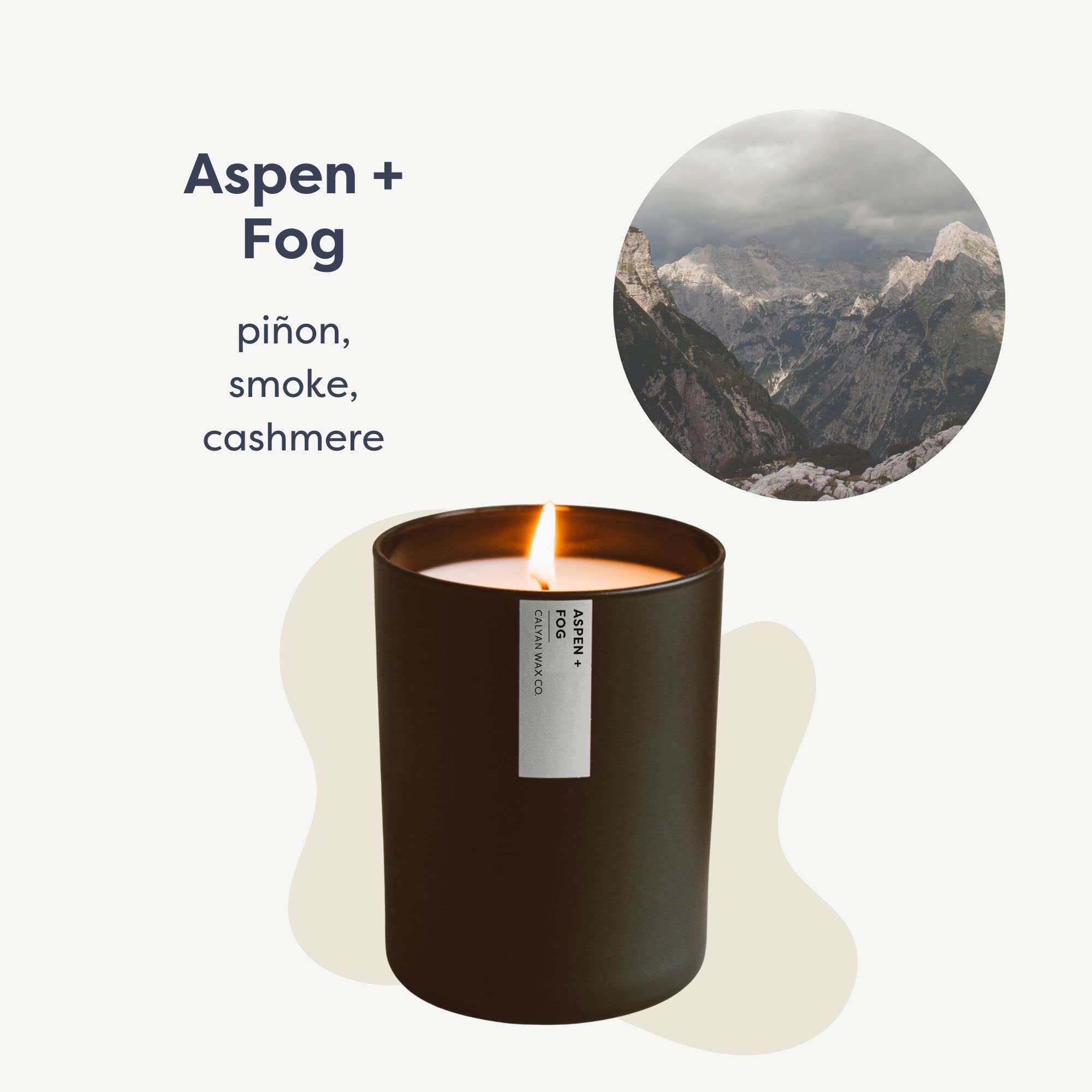 Angled view of the Aspen & Fog candle in the matte black tumbler.
