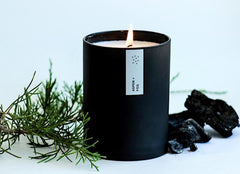 Packaging image showing the Aspen & Fog candle with its label beside the tumbler.