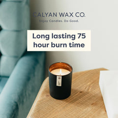 Fir & Clove candle with 75-hour burn label