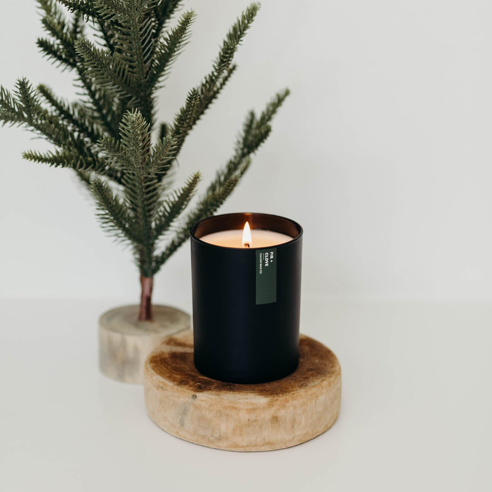 Front view of matte black tumbler candle