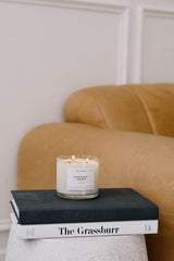 Aspen & Fog candle in a cozy living room