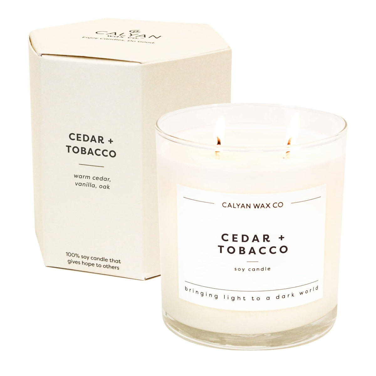 Front view of Calyan Wax Co. Cedar & Tobacco 2 Wick Candle in glass jar