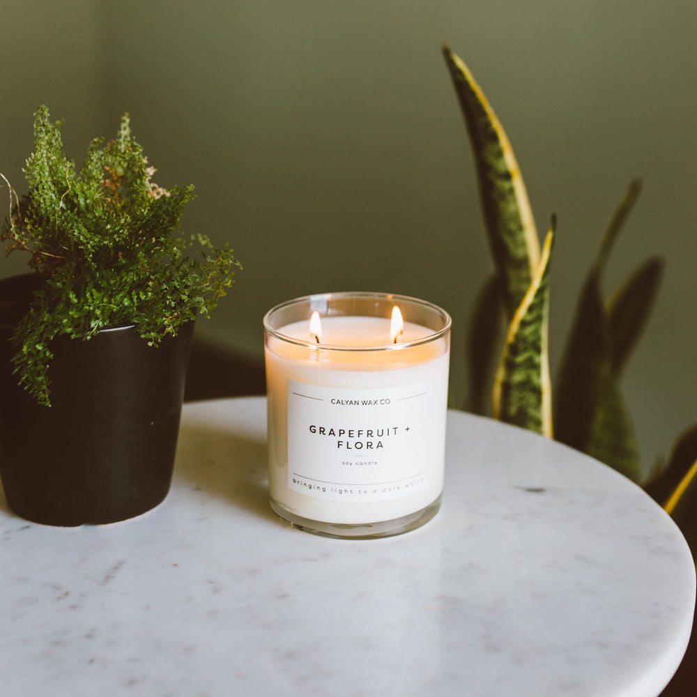 Detail of two wicks and natural soy wax in Grapefruit & Flora candle