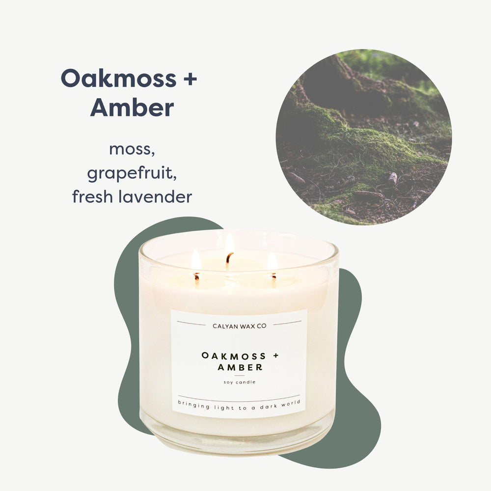 Oakmoss & Amber label close-up on candle