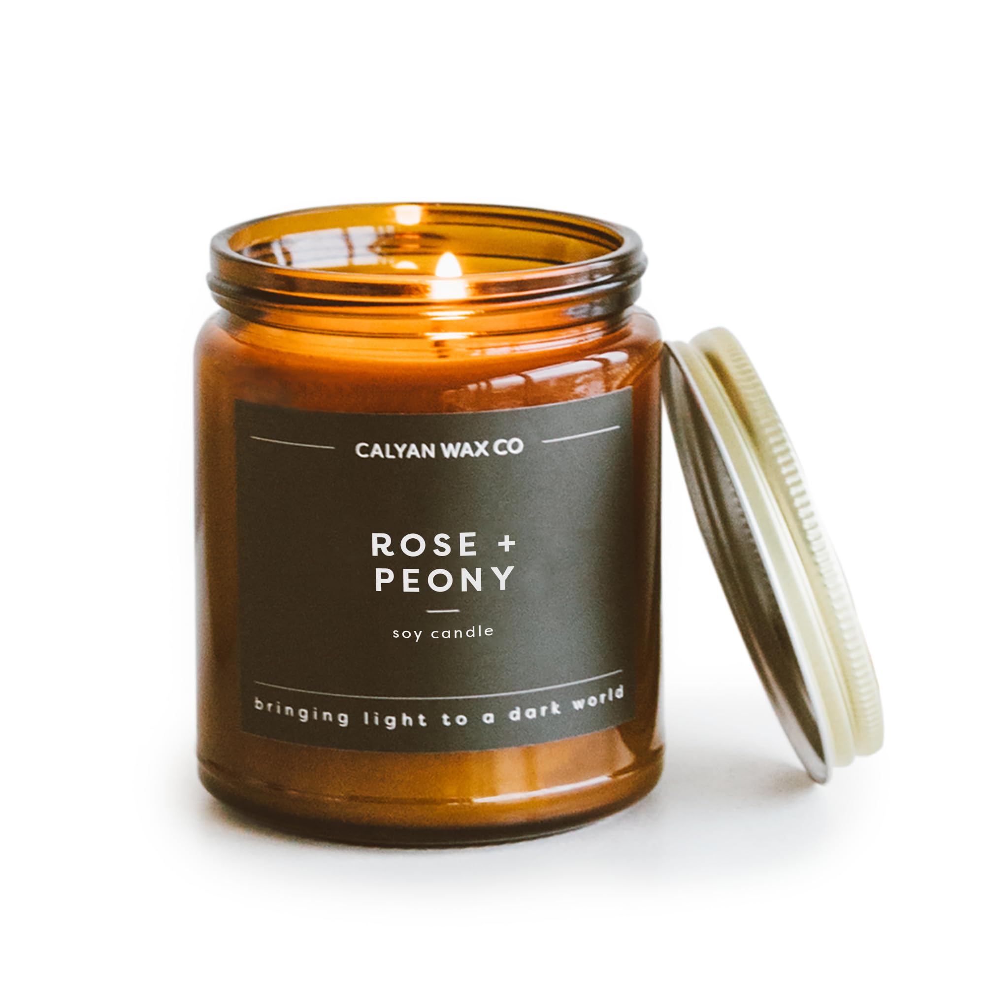 Calyan Wax Co. Rose & Peony candle in an amber glass jar, 7.2oz