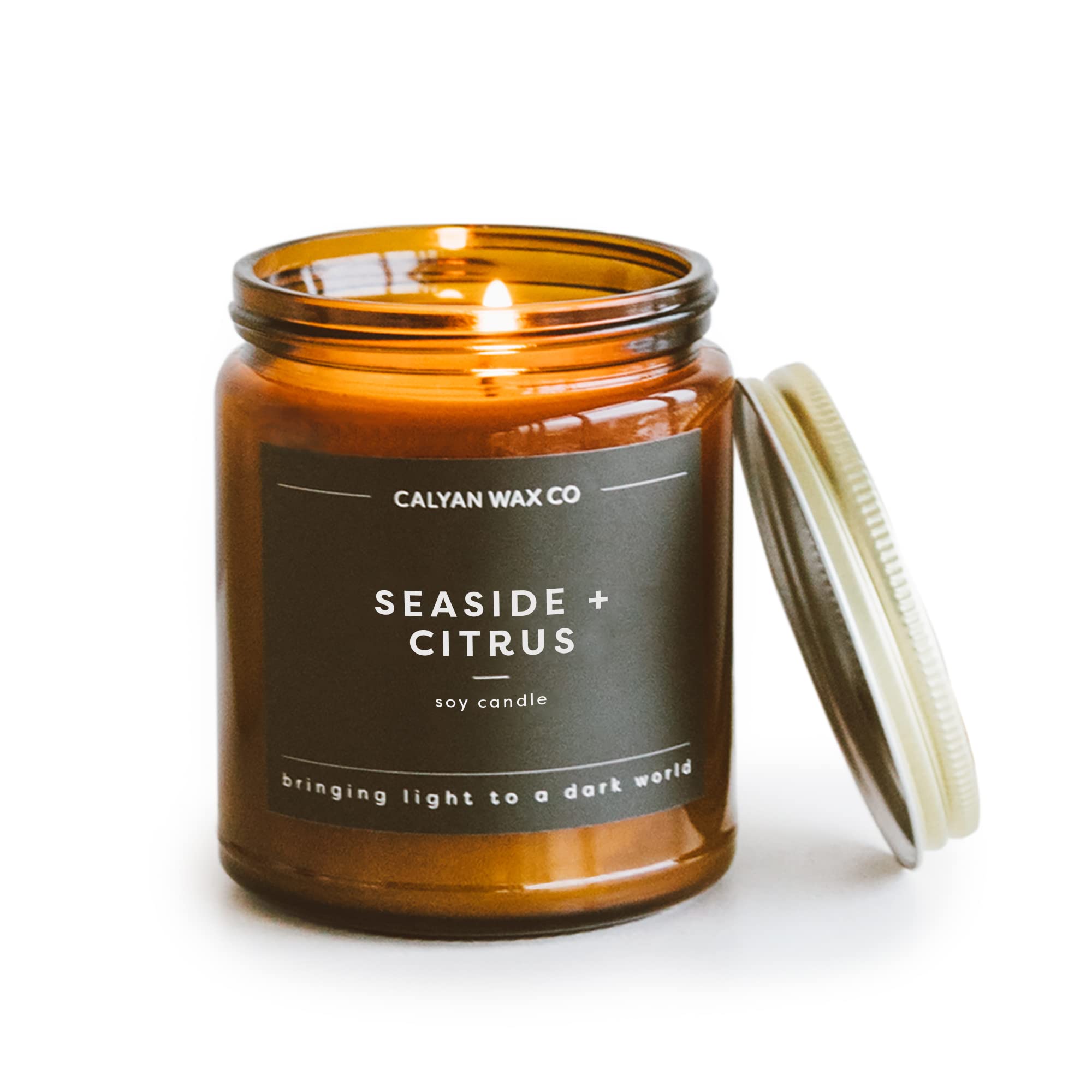Calyan Wax Co Seaside & Citrus candle in amber glass jar - front view