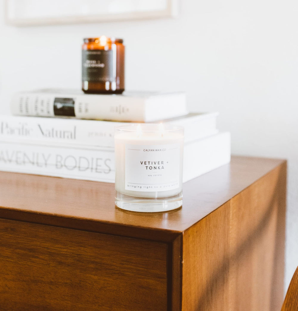 Vetiver & Tonka candle in its large glass jar with label