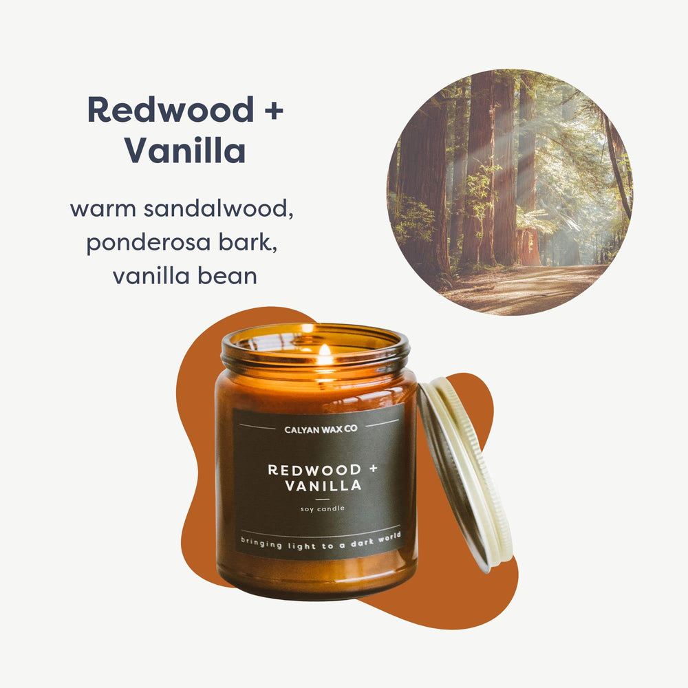 Close-up of Redwood & Vanilla candle label on amber jar