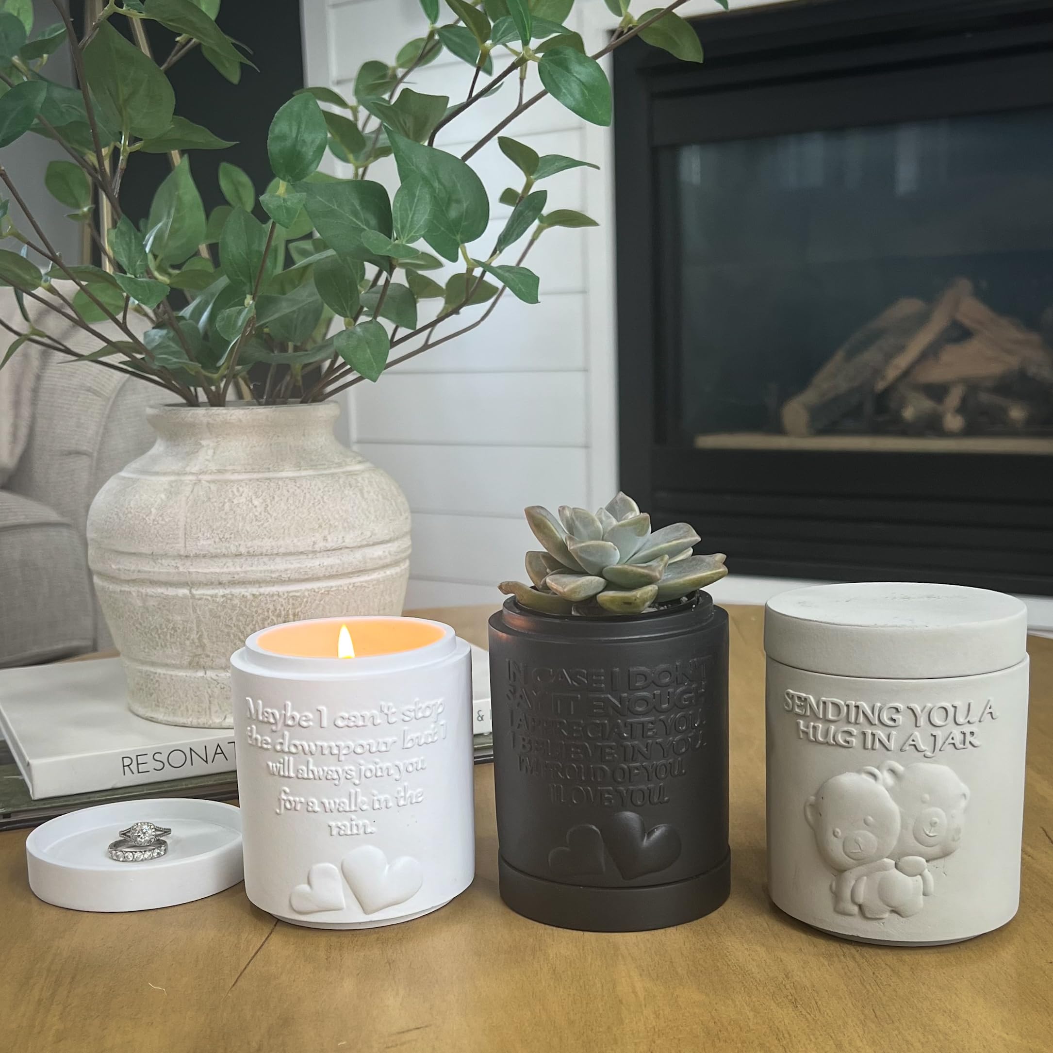 Candle planter repurposed as a chic succulent planter.