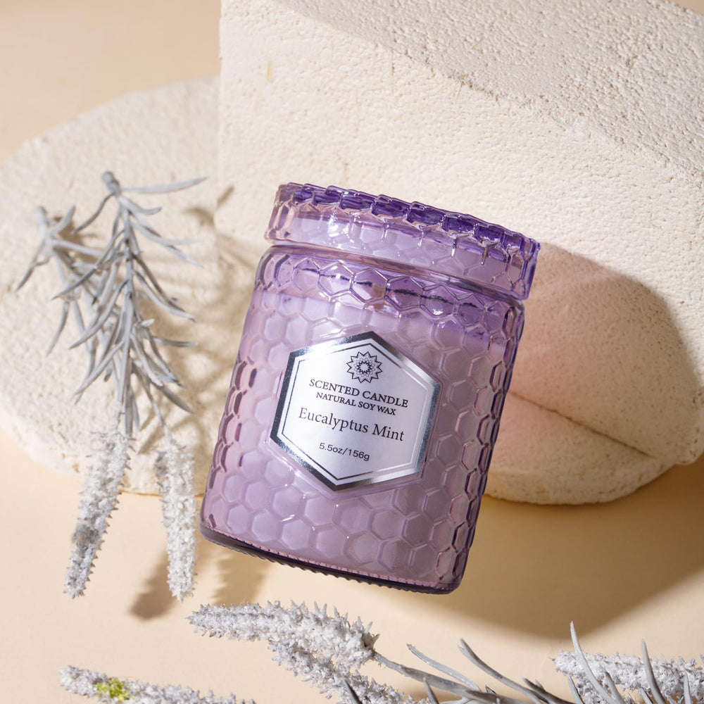 Sandalwood Rose scented candle in purple embossed cup