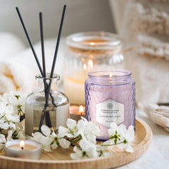 Lavender & Juniper scented candle in purple embossed jar