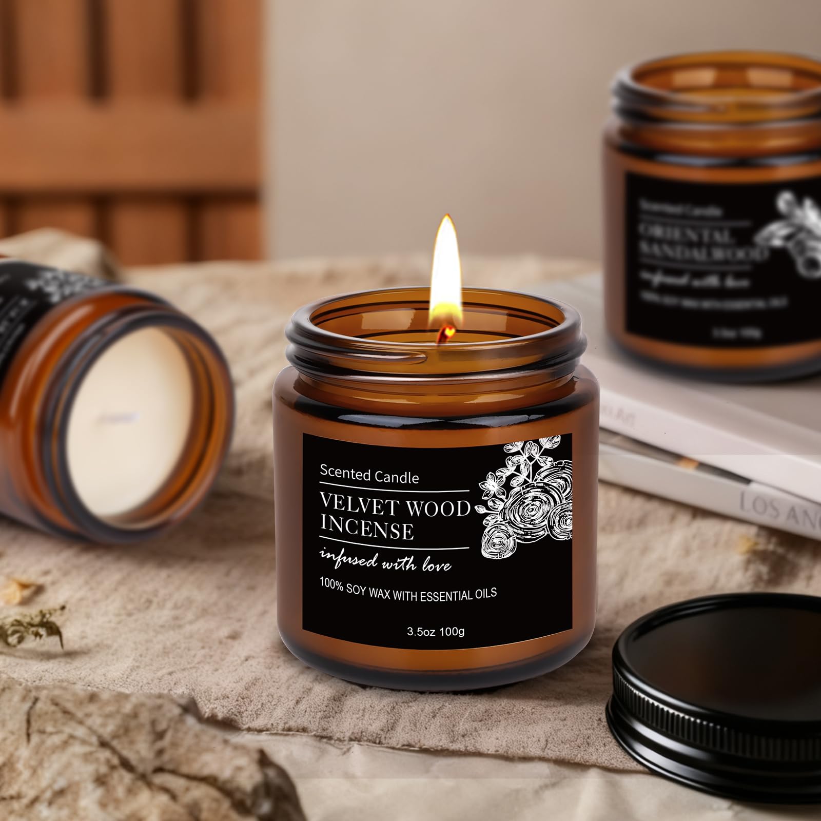 Norwegian fir and snow-cypress scented soy candle in a dark glass jar