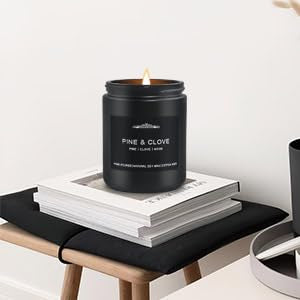 Lit candle creating masculine home ambience