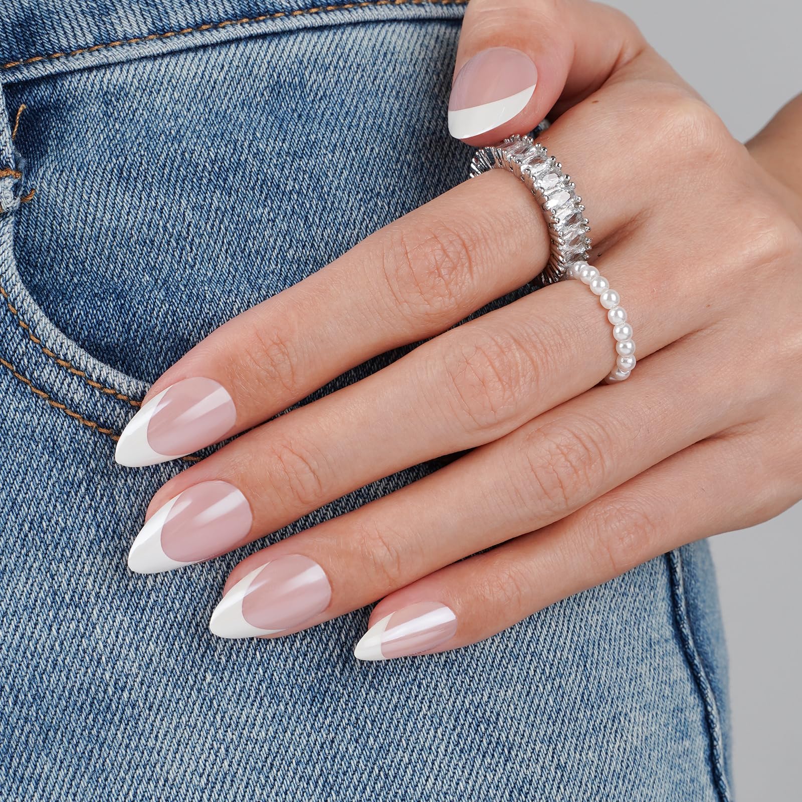 CANVALITE chrome French tip short almond nails for a sleek salon look.