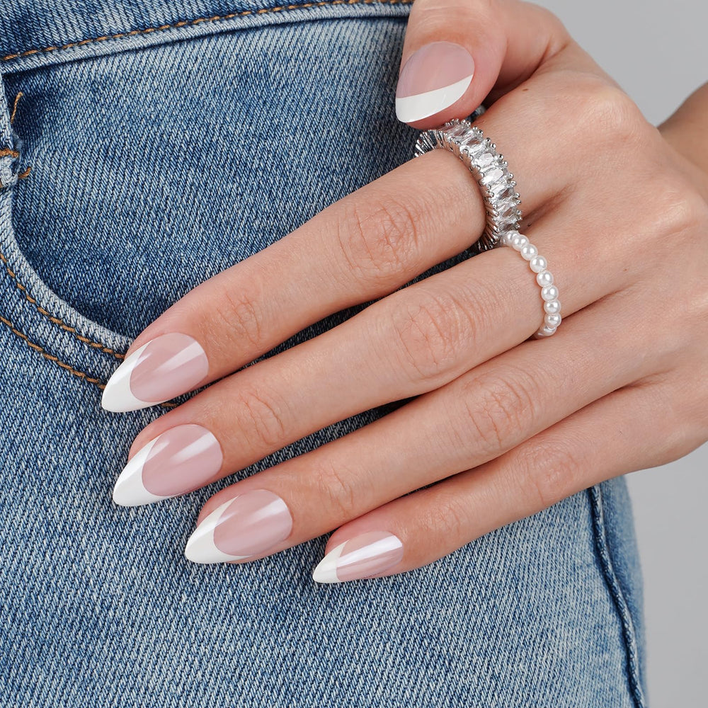 CANVALITE chrome French tip short almond nails for a sleek salon look.