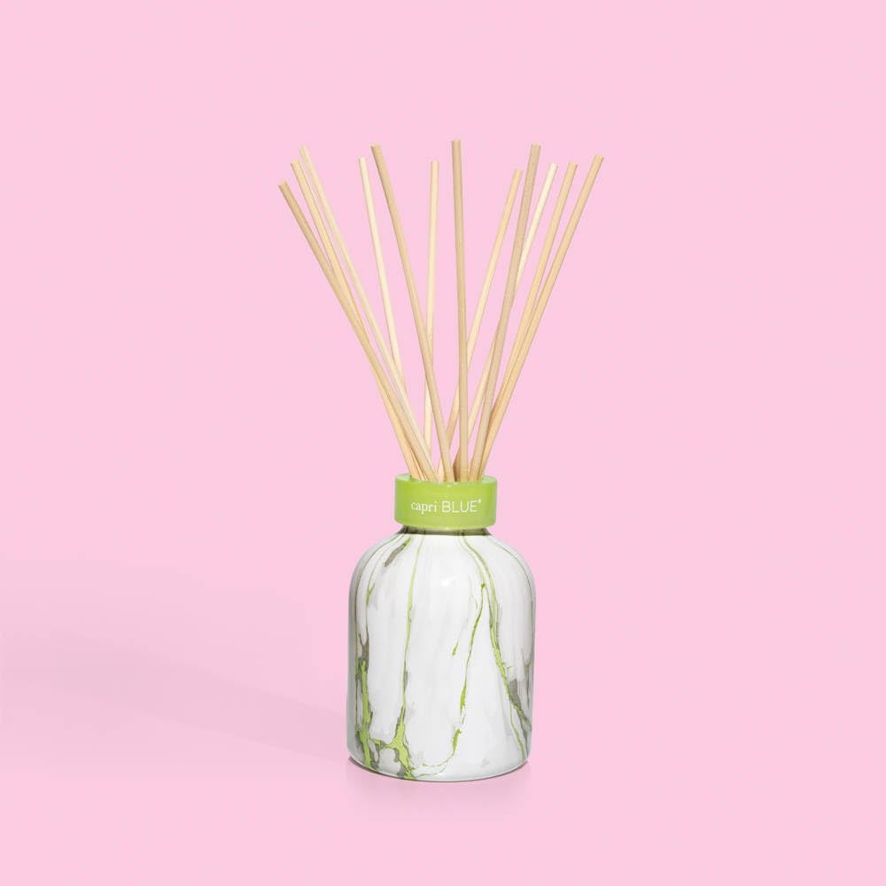 Reed diffuser in a stylish home setting with Honeydew Crush scent