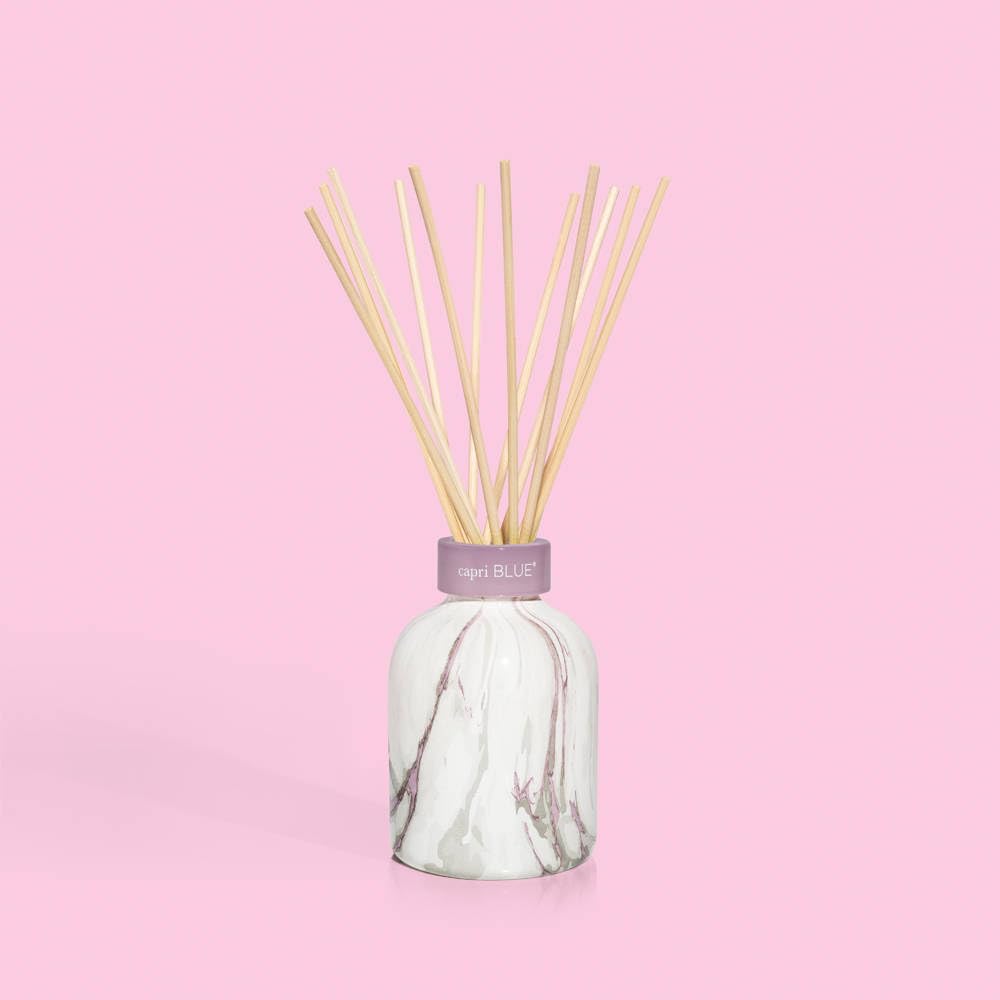 Complete Capri Blue Modern Marble set: reed diffuser, oil, and packaging