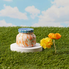 Close-up of Capri Blue Pattern Play 8 oz glass jar candle