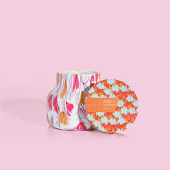 Decorative close-up of glass jar and patterned label – Pineapple Flower scent