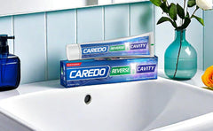 Tooth sensitivity relief close-up with CAREDO toothpaste
